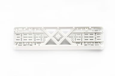 Рамка номерного знаку пластикова біла (без написів, защіпка знизу) 12 Atelie